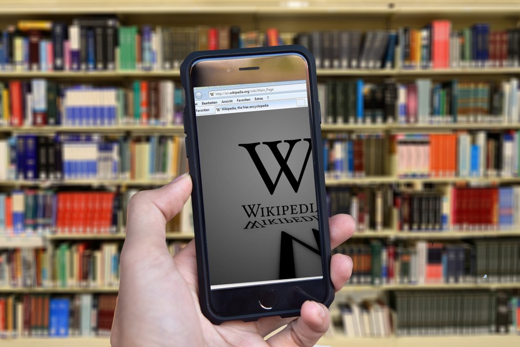 Wikipedia Co-Founder Urges Followers to Replace Chrome Browser with Brave A phone browser viewing wikipedia