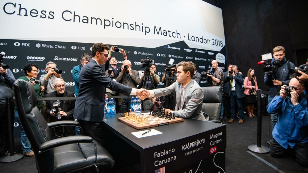 Magnus Carlsen and Fabiano Caruana shaking hands after game 12 of the World Chess Championship