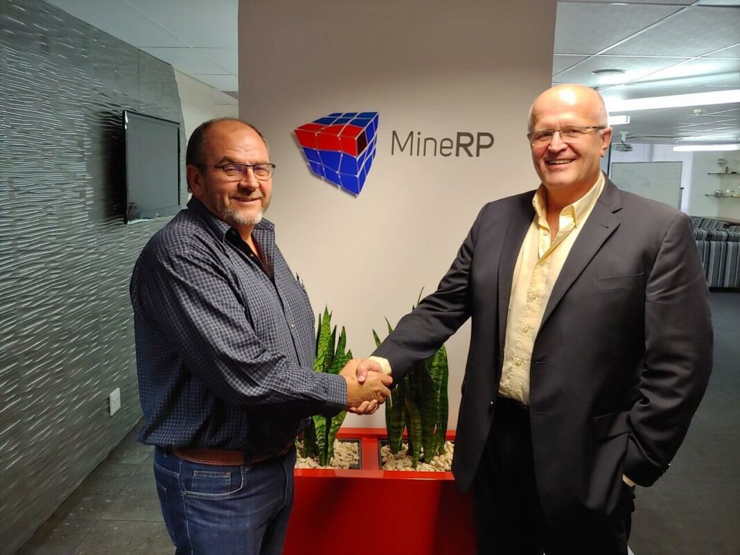 MineRP's Anton Van Der Walt shaking hands with Karuschain CEO Richard Verkley