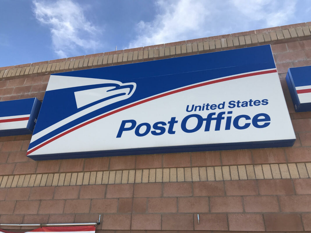 Exterior signage on the front of the United States Post Office