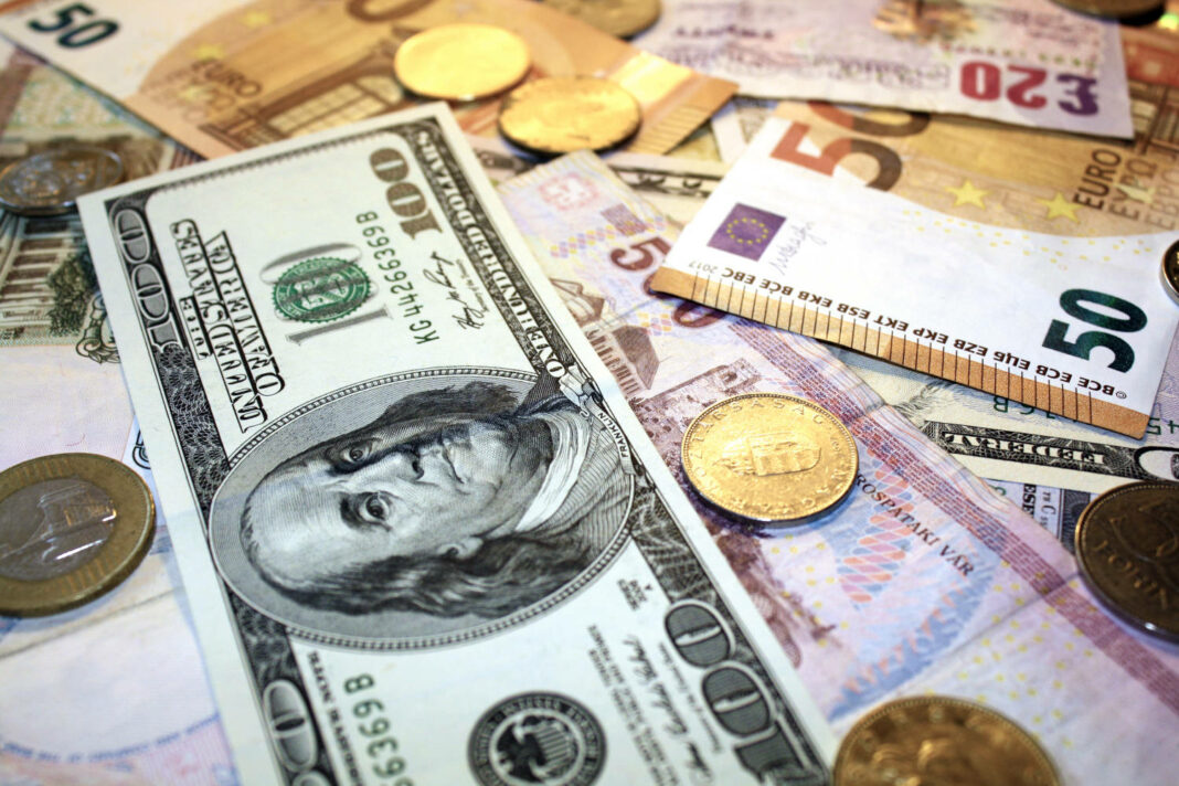 US Dollar and Euro coins and notes