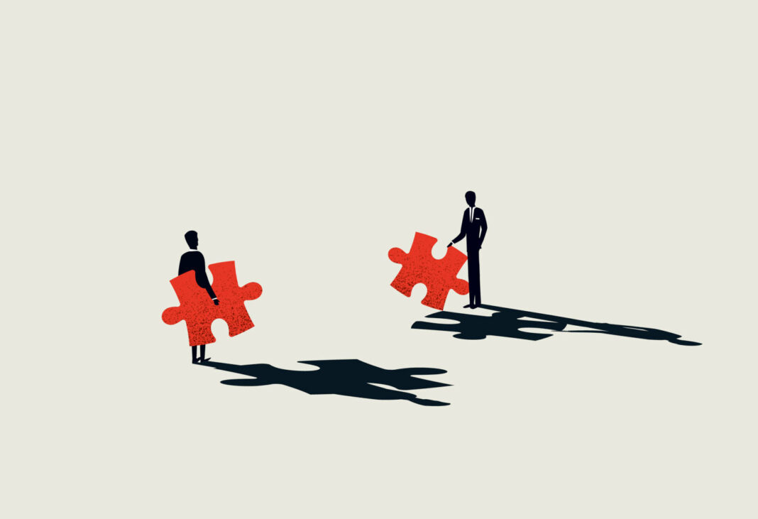 Two men holding puzzle pieces illustration