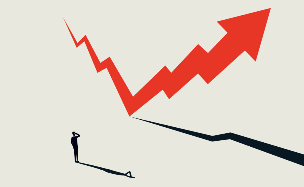 Businessman looking at growth line