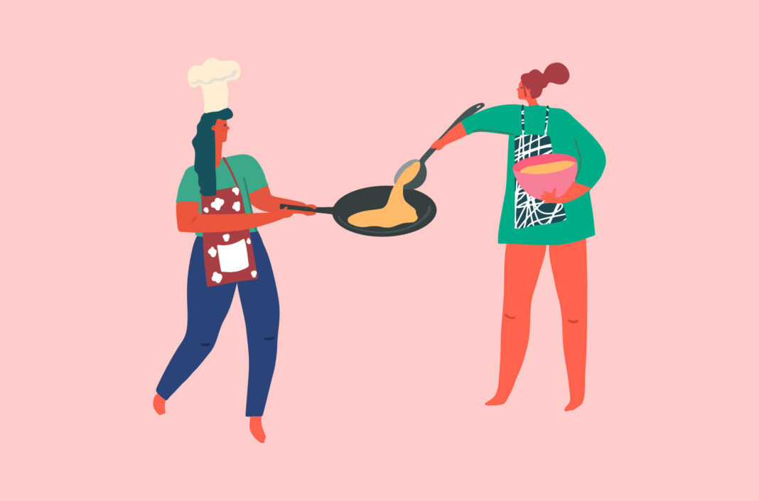 Women cooking pancakes