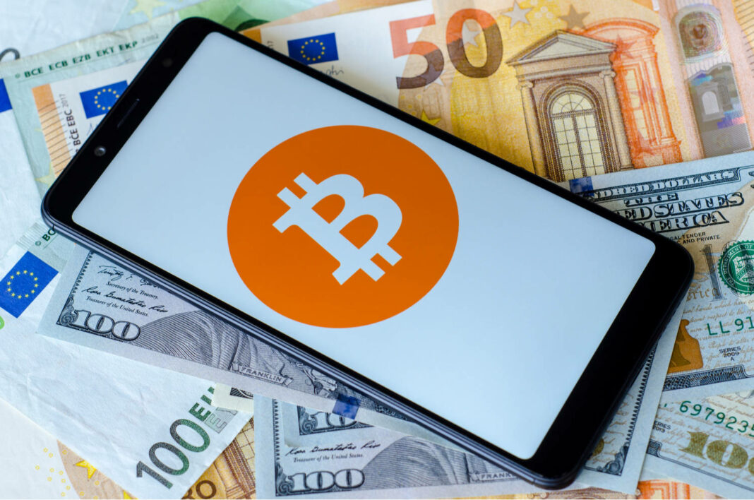 Bitcoin logo on smartphone