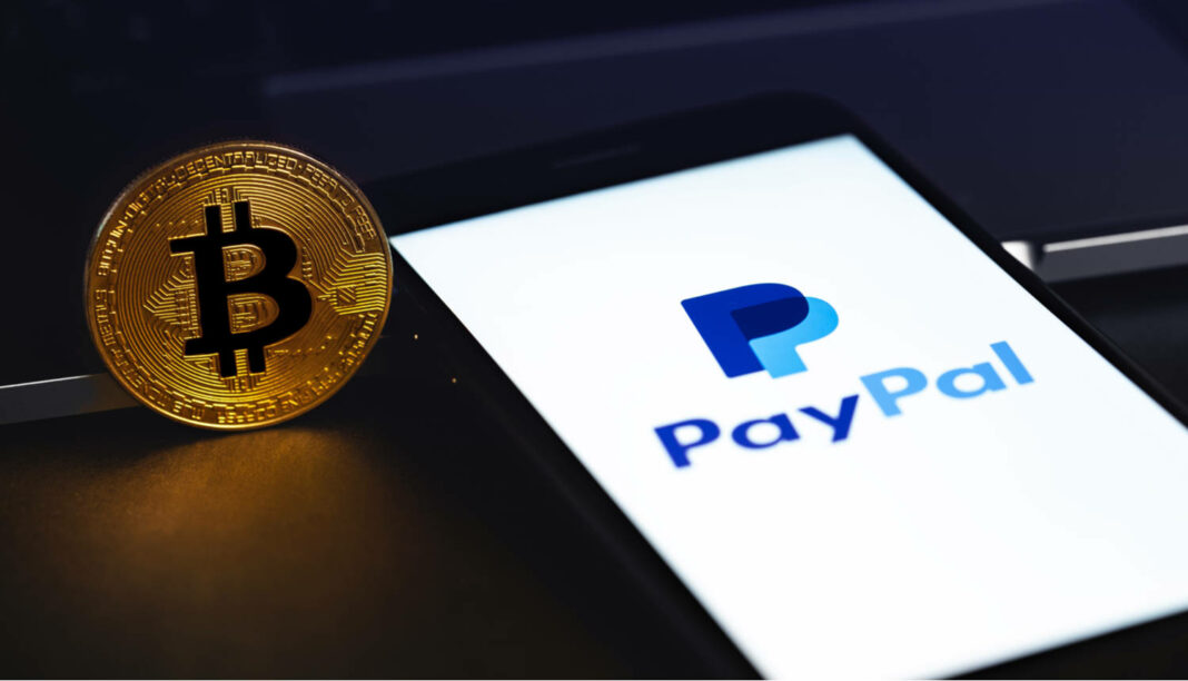 PayPal logo with bitcoin in the back