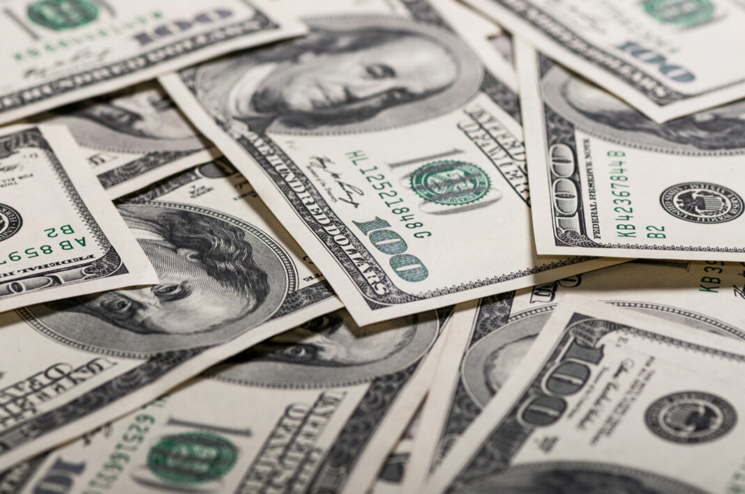 A pile of hundred dollar bills