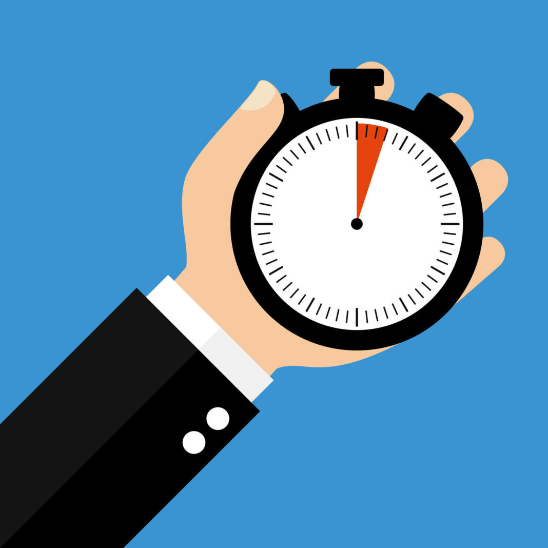 Hand holding Stopwatch showing 3 Seconds