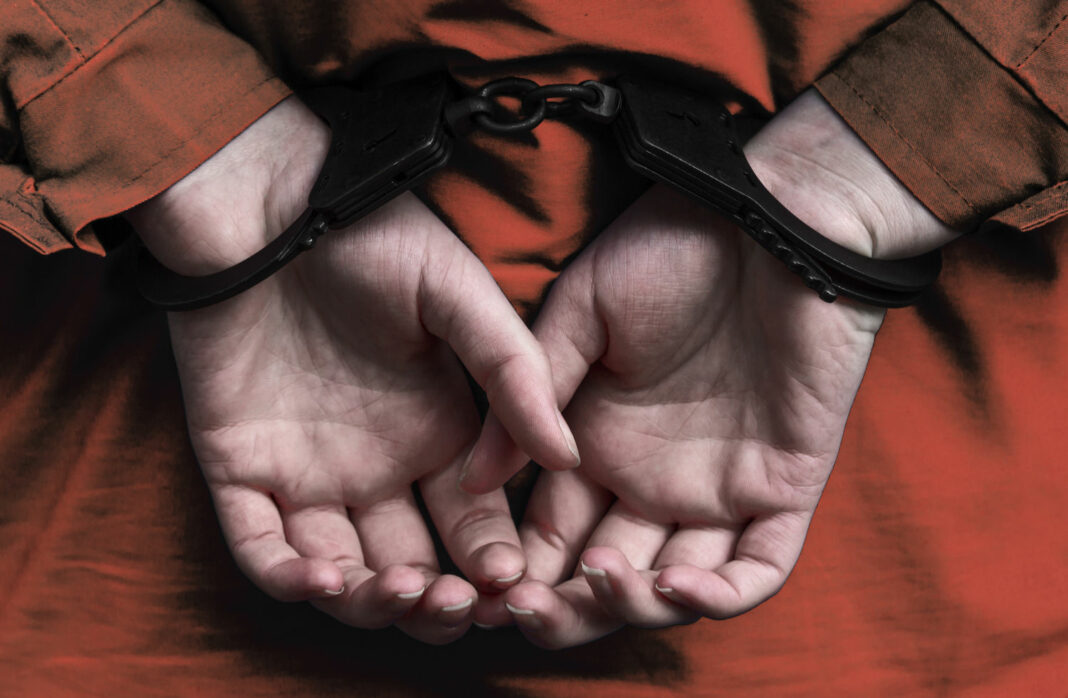 Hands of the girl in handcuffs. arrest. a crime. law. execution of sentences