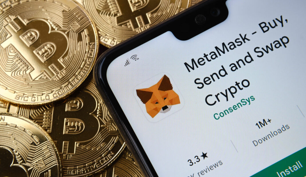 MetaMask app seen on the smartphone screen