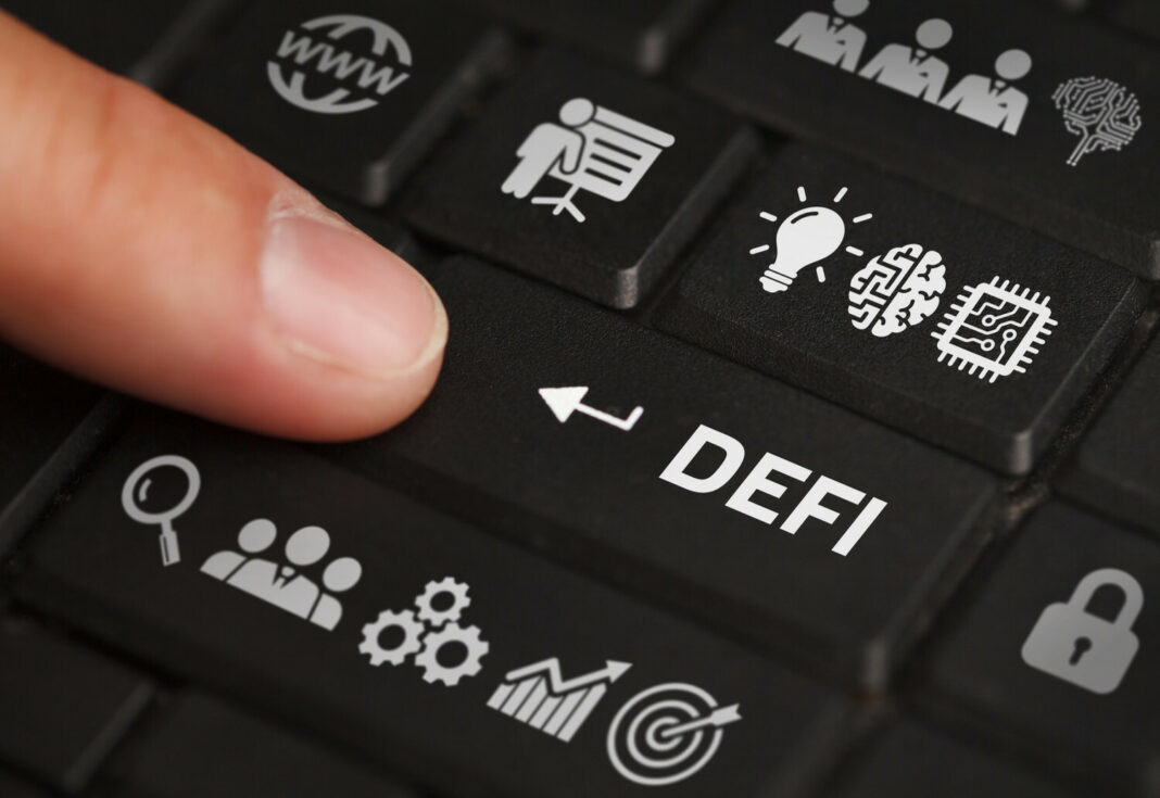 A DeFi keyboard button being pushed
